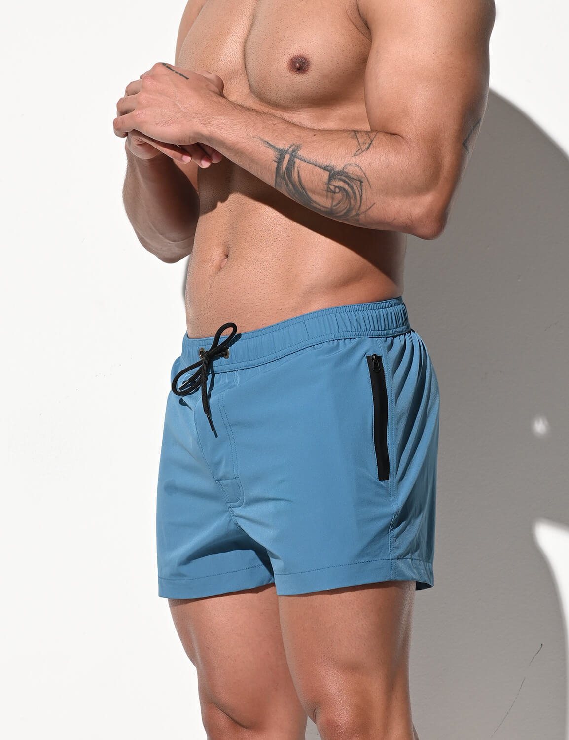 Swim shorts with zip hot sale pockets